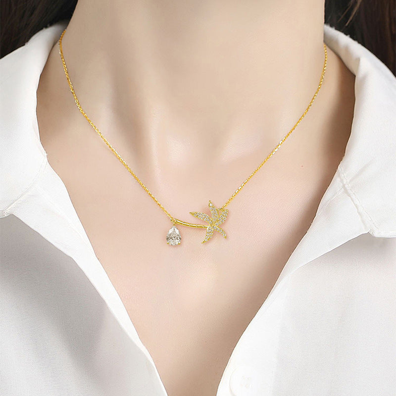 Lönnblads halsband guld