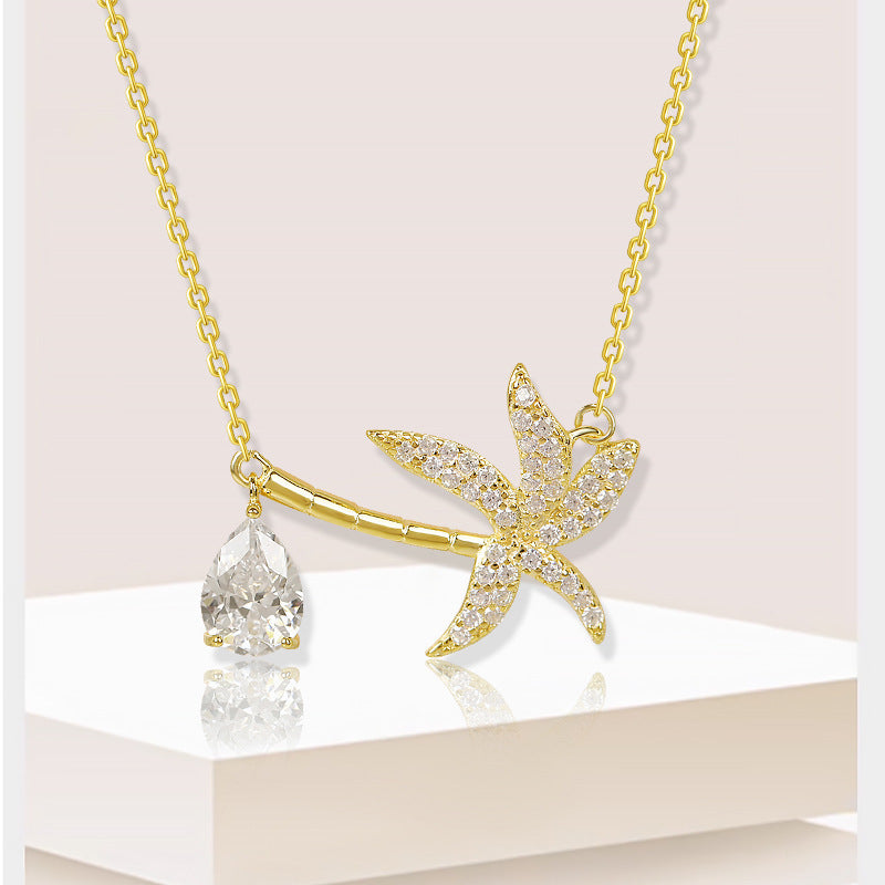 Lönnblads halsband guld